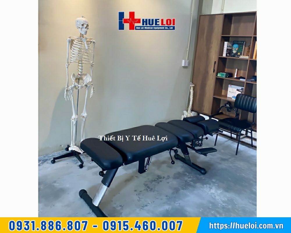 bàn giao giường nắn chỉnh cột sống