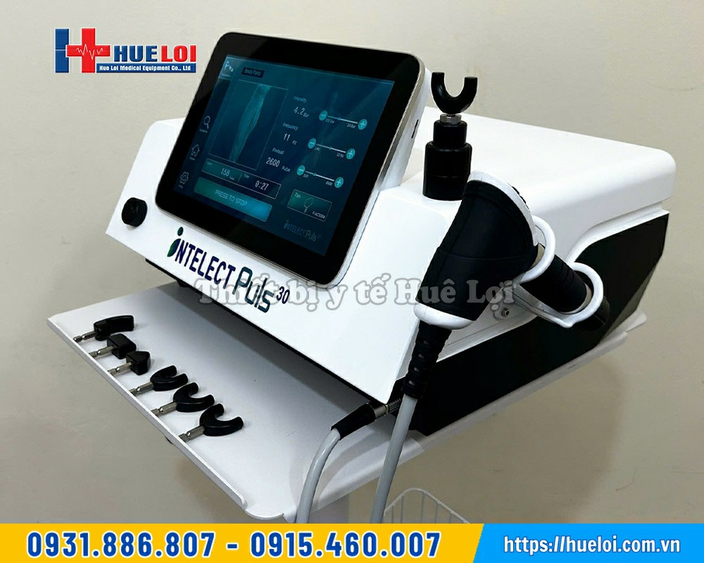 máy xung kích kèm tác động cột sống